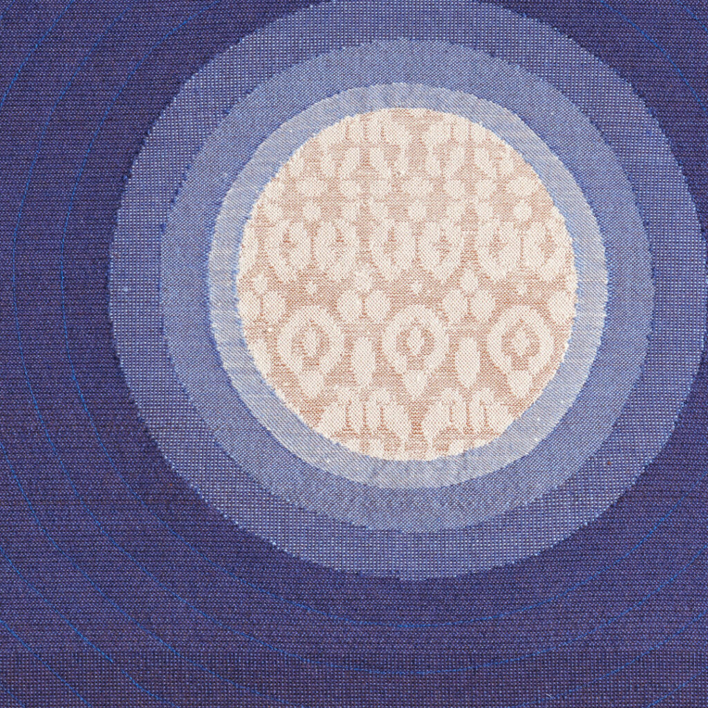 Close up picture of a woven textile artwork