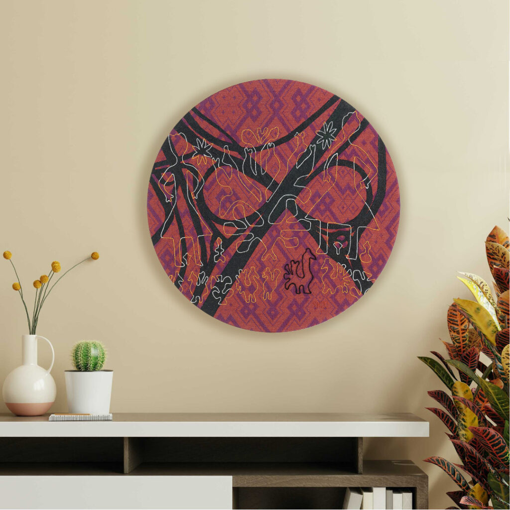 A textile artwork hung on the living room wall.