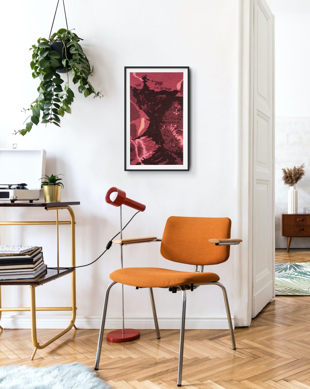 The picture shows a framed fine art giclee print from the artwork Käsittäjä 1, hung on the wall.
