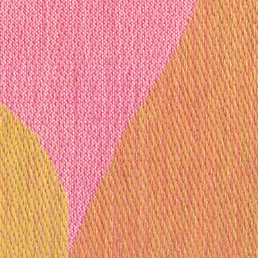 A close-up of the surface of the woven artwork.
